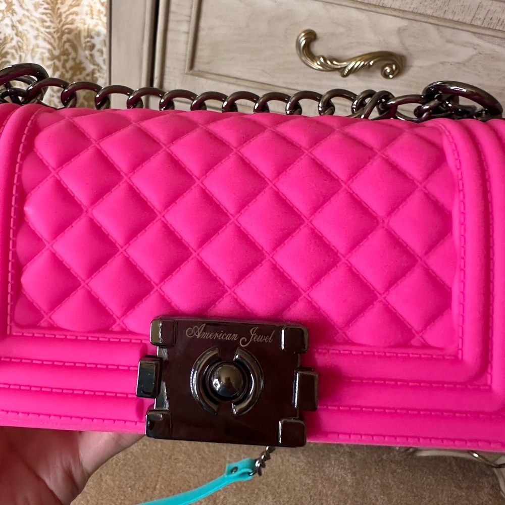 Hot pink cross body bag.